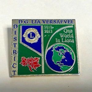 2012-2013 One World in Lions DG Lia Versaevel District Lapel Hat Pin 1.75"